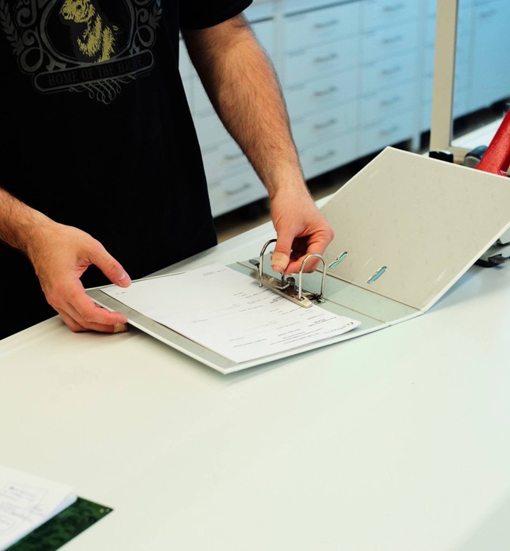 Laboratory binder representing manual documentation and paper-based workflows
